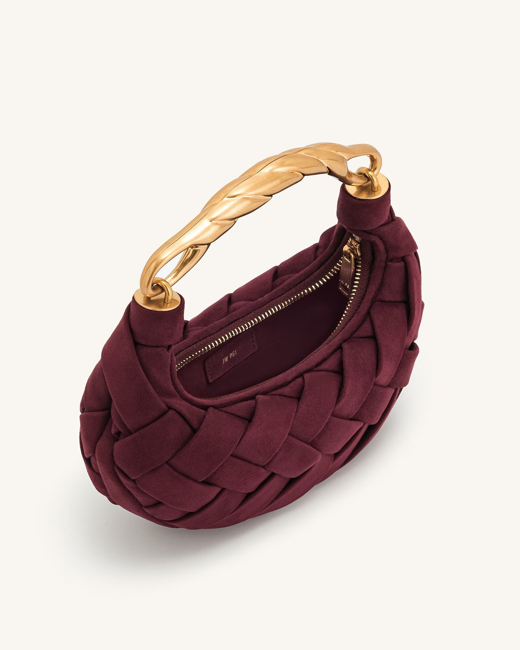 Bolso color burdeos trenzada