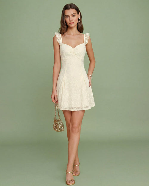 Minivestido de encaje floral en color albaricoque con escote corazón
