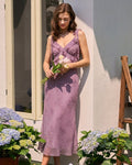 Vestido midi morado con estampado floral y tirantes anudables